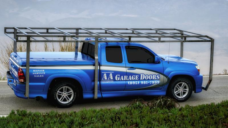 AA Garage Doors blue service truck with ladder rack, lettered with the company name and (805) 981-7999