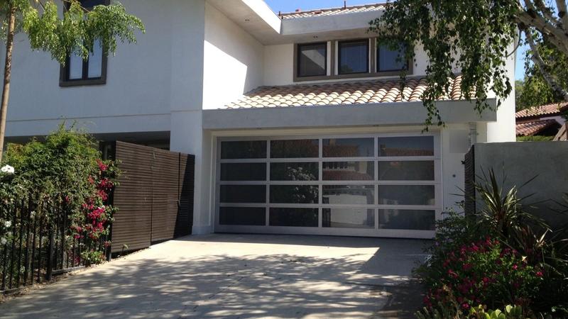 Modern full-view aluminum and glass garage door