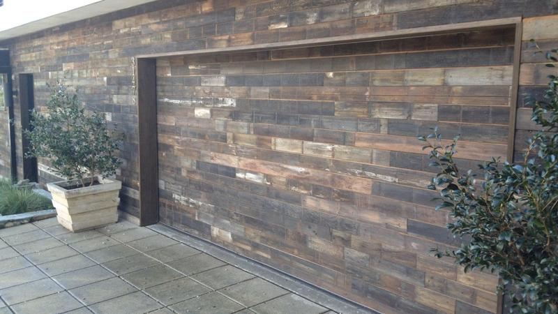 Flush garage door with a reclaimed-wood look